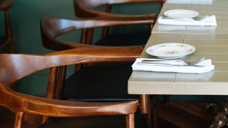 A classical wooden dining area furniture set for the guests