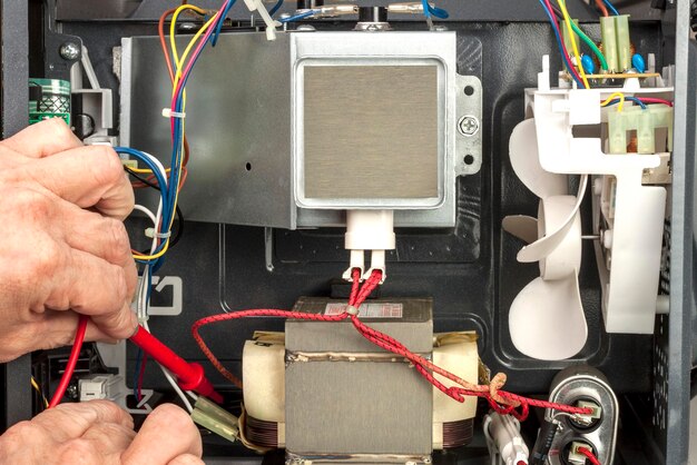 cropped-hand-technician-repairing-cpu_1048944-22944505